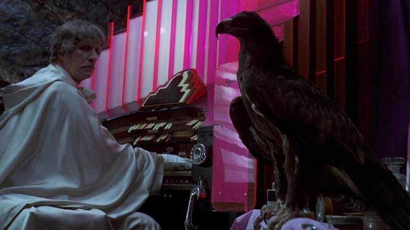 background Dr. Phibes Rises Again