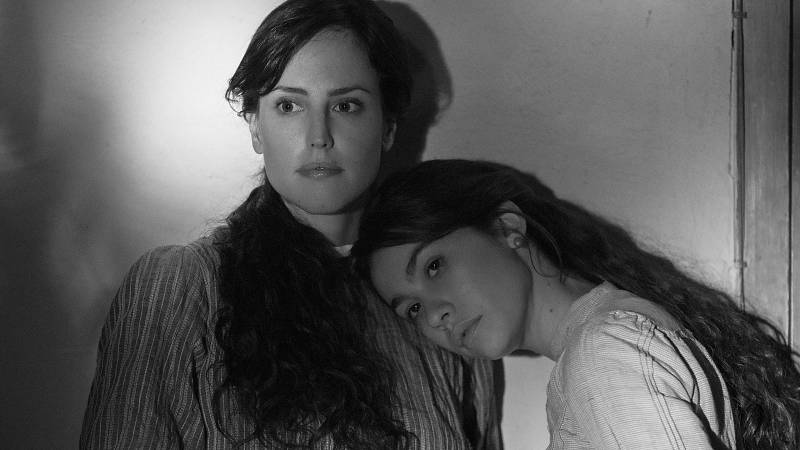 background Elisa and Marcela