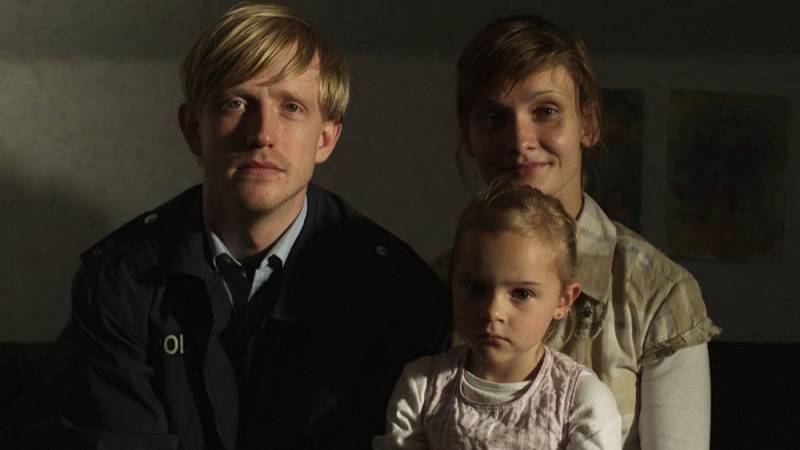 background Die Frau des Polizisten