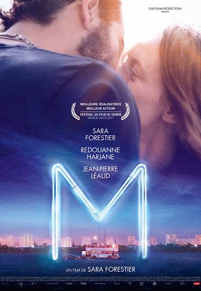M.